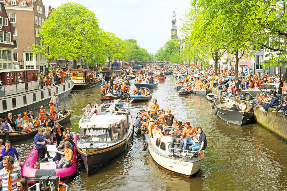 Boats on a Canal for Amsterdam Kings Day